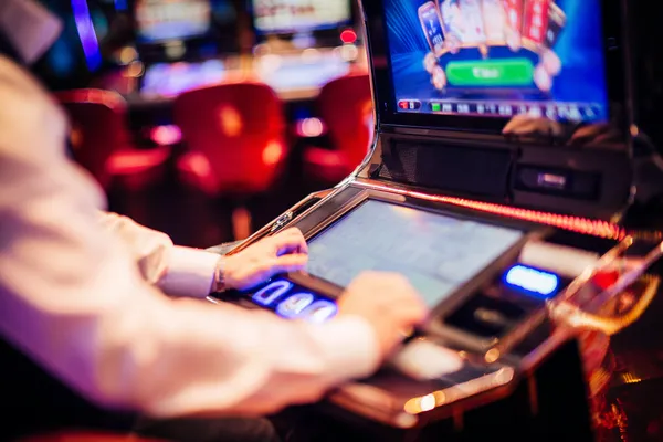 A young woman relaxing with her phone while dynamic casino elements float around her, illustrating the smooth mobile experience offered by the BANGBEF app.